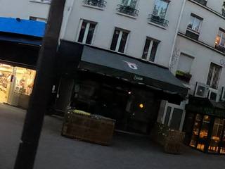 Vue de la rue à l’adresse de Brasao Alesia- Restaurant poulet braisé Paris 14ème
